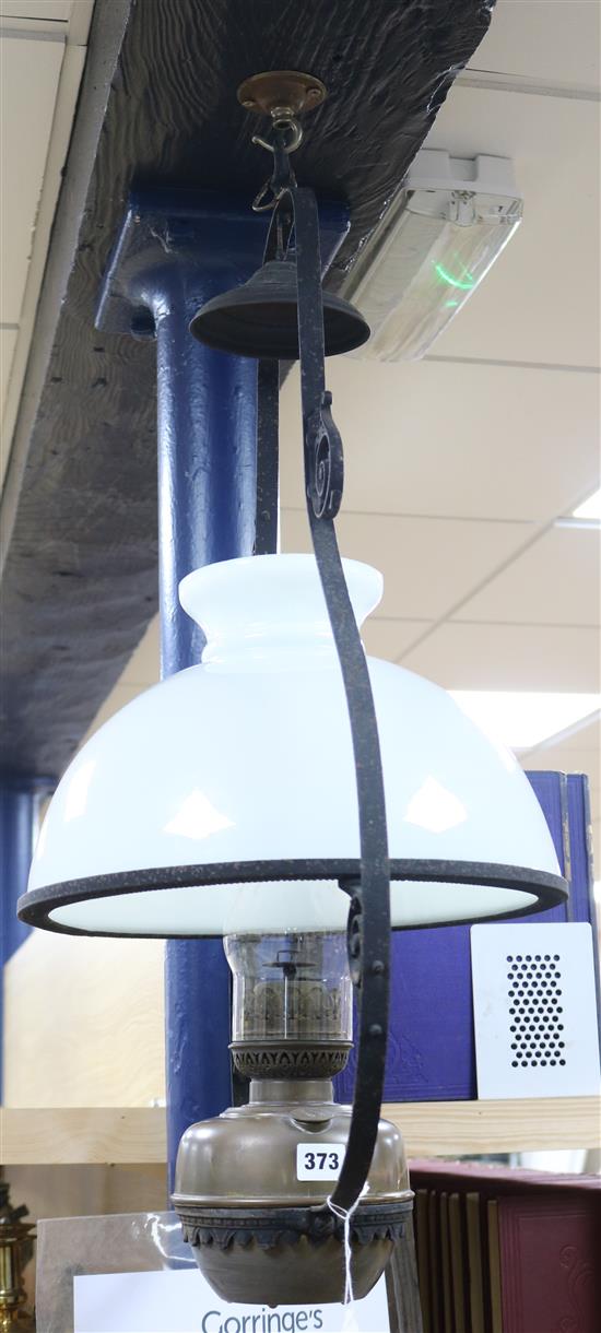 A hanging oil lamp